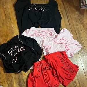 Set of 3 marketplace tracksuits reading: I am Gia size small - Black, Pink, Red
